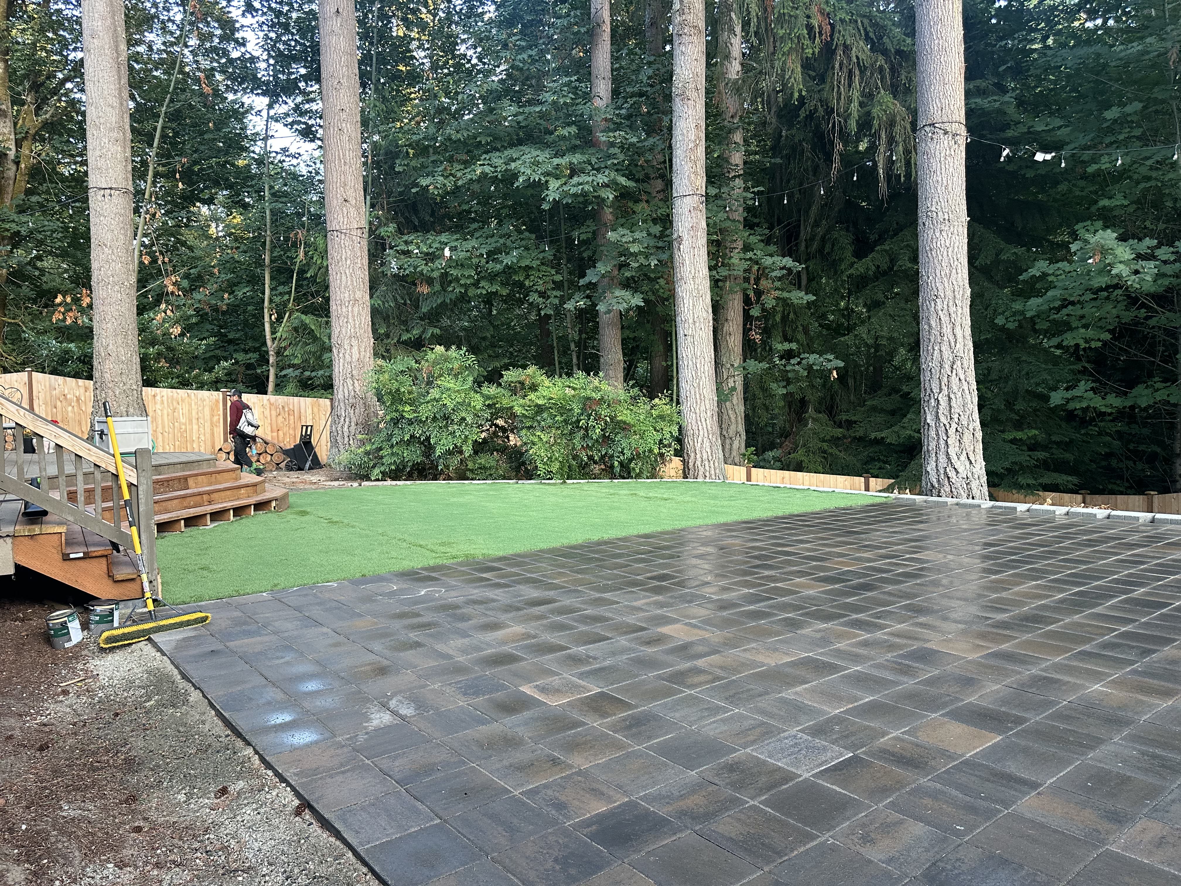 Seattle backyard landscaping with new patio and garden beds